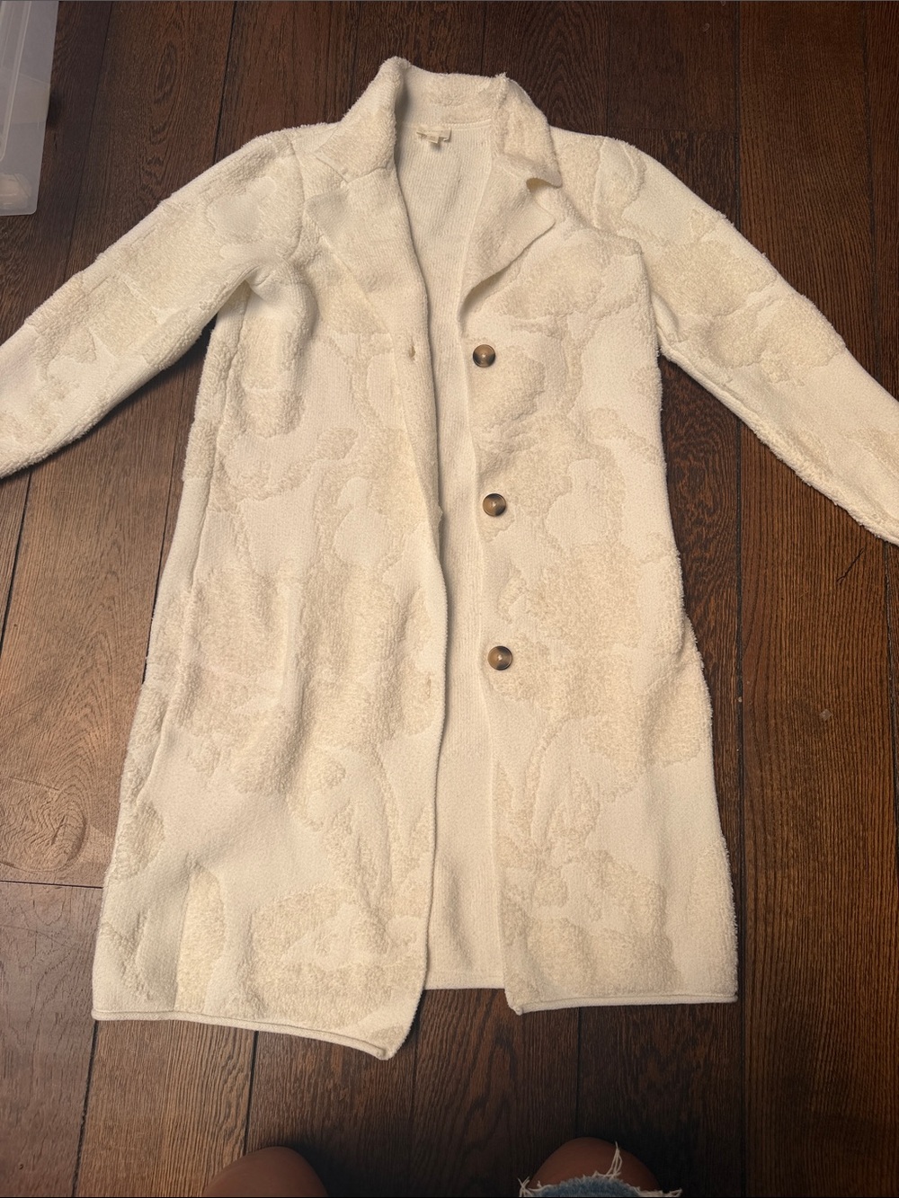 Cream Women's Long sweater. with Subtle Floral Texture
